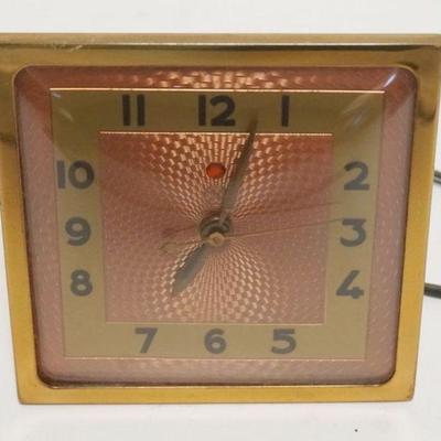1252	VINTAGE DECO STYLE GE ELECTRIC CLOCK, APPROXIMATELY 5 IN X 5 1/2 IN
