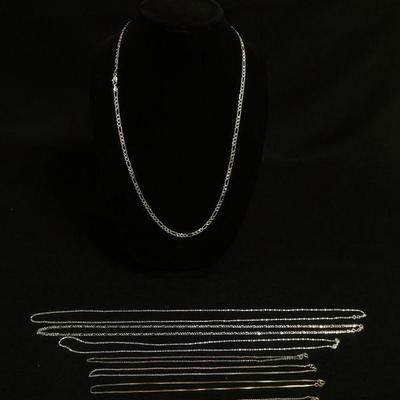 1074	8 STERLING SILVER CHAINS, 1.145 , LONGEST CHAIN APPROXIMATELY 30 IN
