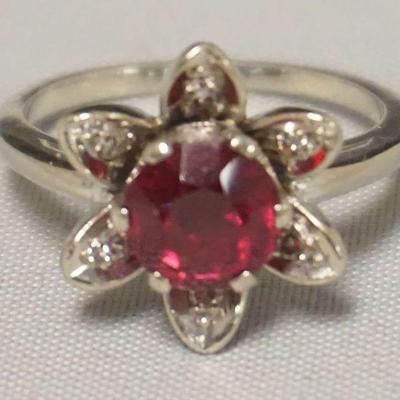 1067	RUBY & DIAMOND STONE FLOWER RING SIZE 5.5, 2.5 DWT WITH STONES, MARKED 14K

