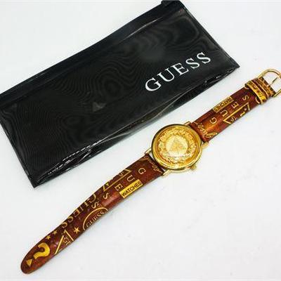 Lot 004  
GUESS wrist watch & case