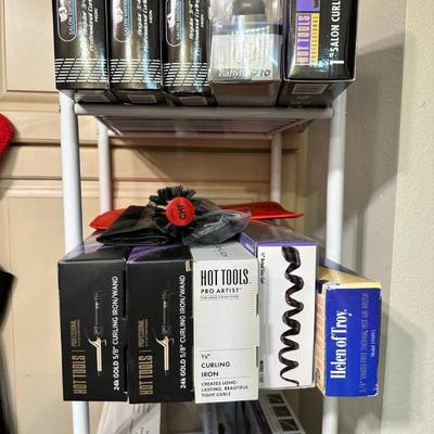 Curling irons, hair dryers, flat irons
