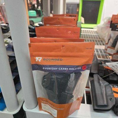 #3418 • NEW!!! (7) Rounded Sig Sauer Holsters
