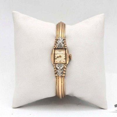 #718 • 10k Gold Filled Diamond Accent Bulova Watch
