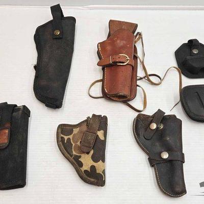 #3464 • (7) Gun Holsters
