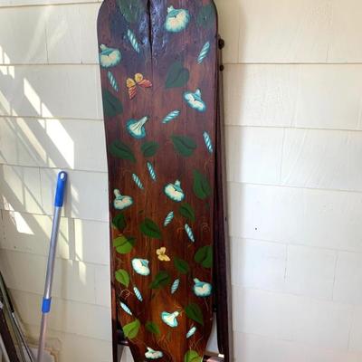 Paint decorated wooden ironing board 