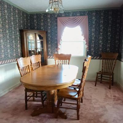 For immediate purchase at $399-Oak dining table with 6 chairs, 2 12" leaves, 2 pedestal bases. 60" x 40".