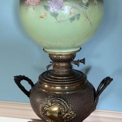 Antique converted parlor oil lamp with hand painted globe
