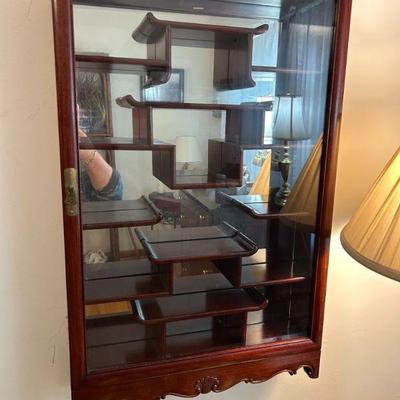 Hanging asian trinket case. 