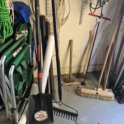 lawn hand tools, shovel, rake and folding chairs