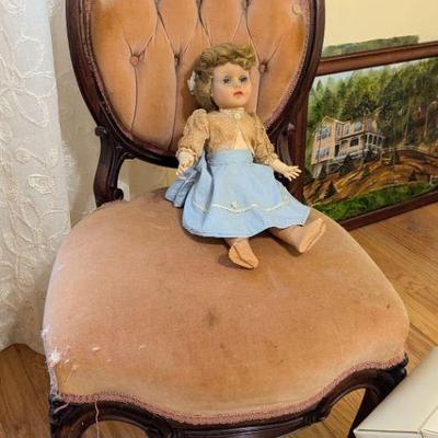 Vintage doll on Victorian chair
