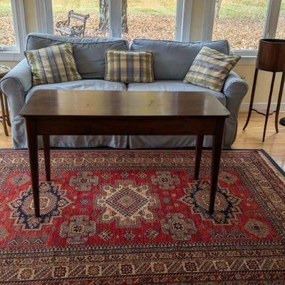 Wool rug and sun room furniture
