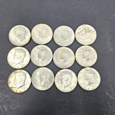  Lot of (12) 1964 Kennedy Half Dollars - Circulated