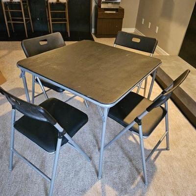 Cosco Black Folding Card Table and Four Folding Chairs with Seat Cushions