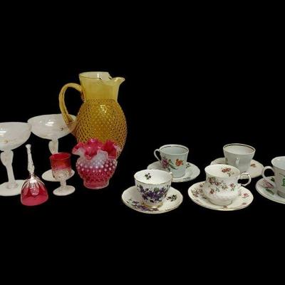 LYZE816 Vintage Glass And Teacups	Assortment of decorate glass,, drink glasses, and teacups. Teacups have matching saucers.
