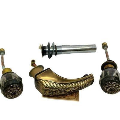 LYZE813 Vintage Deltique By Delta Bath Fixture	Deltique bathtub spout and handles. Ornate gold with smokey colored knobs. Includes...