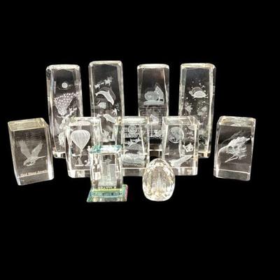 ROMO513 Collection Of Laser-etched Paperweights	Four 6" tall holographic glass paperweights depicting peacock, dragonfly, turtles...