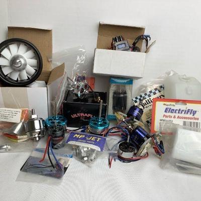 ROMO601 Brushless Motors And More	This lot includes fuel tanks, assortment of brushless motors from Detrum, Ultrafly, tower pro and more,...
