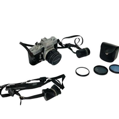 ROMO803 Minolta Handheld Camera	Minolta SR-T-101 camera.comes with strap with attach film carrier, as well as three extra lens filters in...