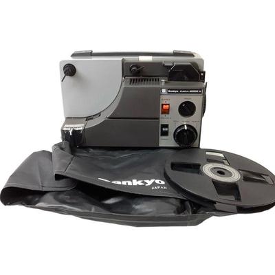 MANA301 Vintage Sankyo Dualux-2000 H 8MM Film Projector	Unit comes with one reel and a plastic cover.   Unit was made in Japan.  Body No....