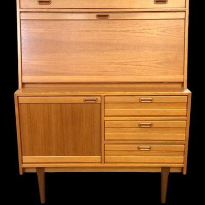 MANA216 Mid Century Teak Veneer Desk	Has many compartments, with a hinged work surface. Has a locked compartment but doesn't come with...