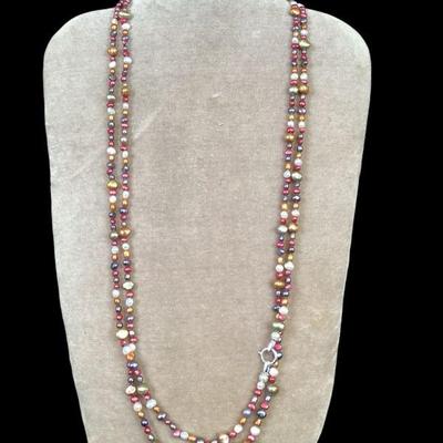 LYZE510 60” Pierre Lang Necklace	60" strand of multicolored seed pearls with Pierre Lang mark on clasp
