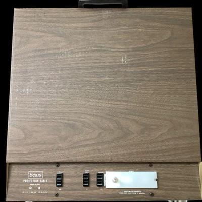 MANA303 Sears Projector Table	Unit is compact and comes in original box.

