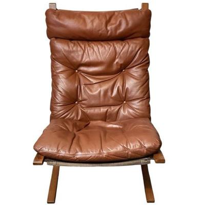MANA543 Armless Leather Chair	Deep brown wood with canvas base and removable leather cover. Canvas is threaded to the frame. Zips are in...