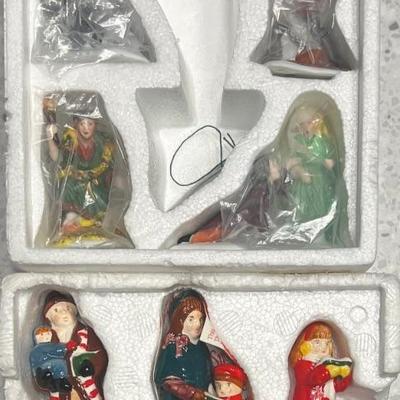 Department 56 Snow Village Caroling Family And Heritage Village Collection Christmas Carols Sprirts