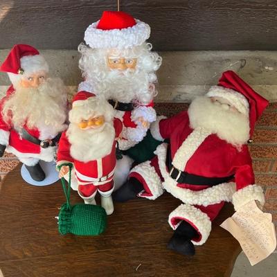 (4) Vintage Plastic And Material Santa Figurines - (2) With Stands (as Is)