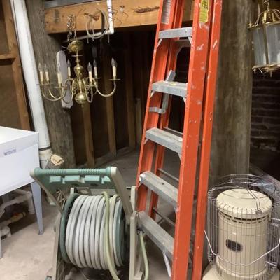 SOLD-6’ ladder, garden hose and cart, kerosene heater