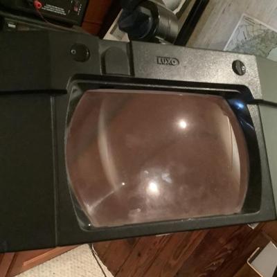 mounted magnifier with arm extender 