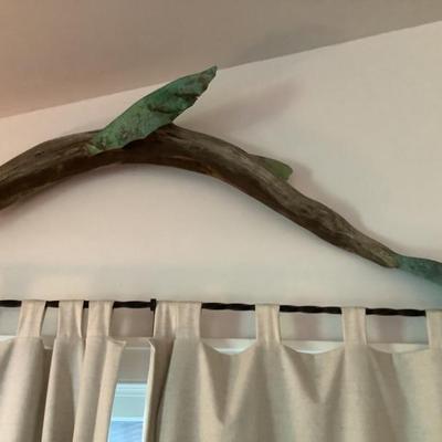 $99 driftwood and metal dolphin