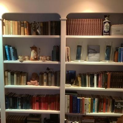 Lots of books, book sets, and decor