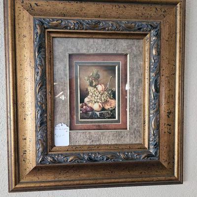 One of a pair of framed art