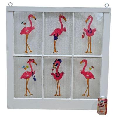 Window frame with flamingos in each pane