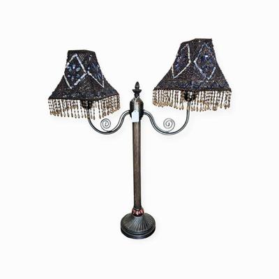 Dual arm beaded lamp
