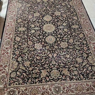 Oriental design rug black and golds