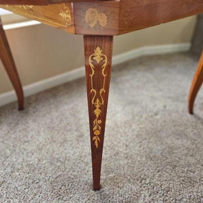 Gorgeous inlay on legs matching cover top