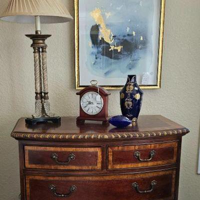 One of two nightstands matching king size master bedroom bed