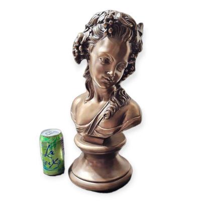 Bust, can for scale
