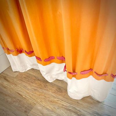Oversized pink, orange and white curtains