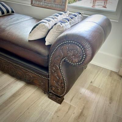 Leather and carved wood chaise