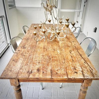 Pottery Barn dining table with four metal chairs