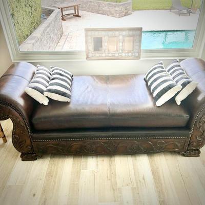 Leather and carved wood chaise