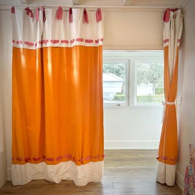 Oversized pink, orange and white curtains