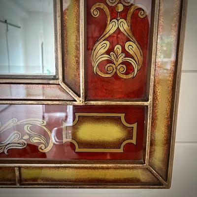 Red Italian-style mirror