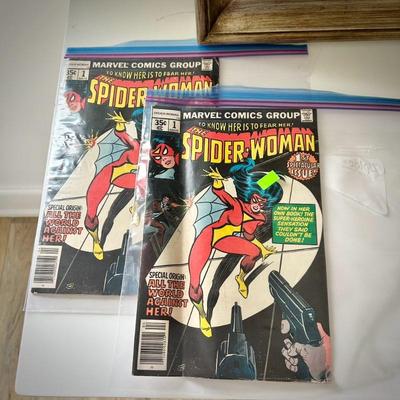 Two original Marvel Spider-Woman first edition comic books