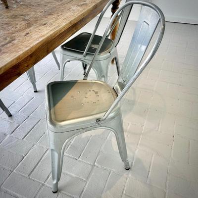 Four metal chairs