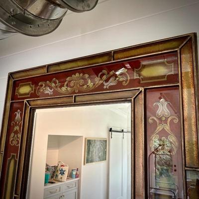 Red Italian-style mirror