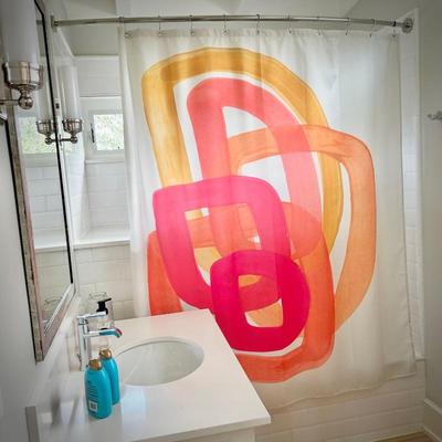 Pink/orange shower curtain and bathroom decor